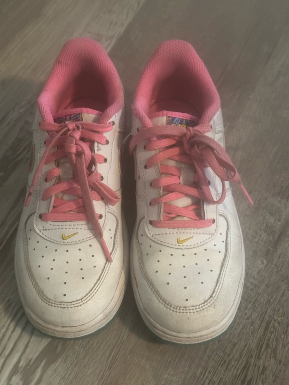 Nike White Sneakers with Pink Laces and Yellow Swoosh
